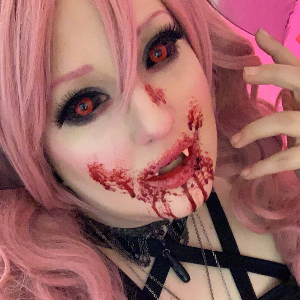 Model are wearing Jigsaw Black And Red Sclera Lenses