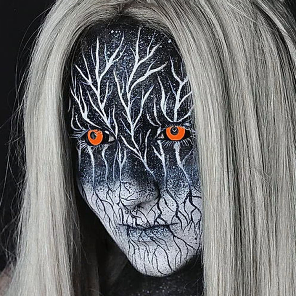 Model are wearing Black and Orange Sclera Lenses